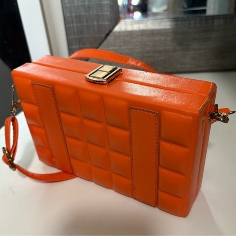 Woman’s box cross body bag in orange color